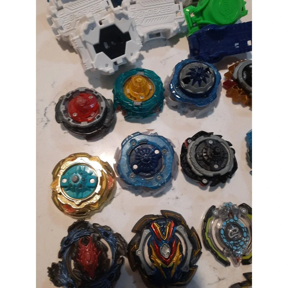 Lot Of 8 Beyblade And Different Parts
